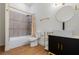 Modern bathroom featuring stylish fixtures, a shower-tub combo and a sleek vanity at 2328 Lakewood Sw Ave, Atlanta, GA 30315