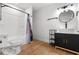 Contemporary bathroom with a sleek vanity, stylish fixtures, and a shower-tub combo, designed for relaxation and convenience at 2328 Lakewood Sw Ave, Atlanta, GA 30315
