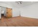 Large bedroom with modern lighting, and access to walk-in closet and ensuite bathroom at 2328 Lakewood Sw Ave, Atlanta, GA 30315