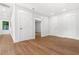 Bedroom with hardwood floors, natural light, and clean white paint on doors and walls at 2328 Lakewood Sw Ave, Atlanta, GA 30315
