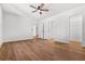 Bedroom with hardwood floors, natural light, and clean white paint on doors and walls at 2328 Lakewood Sw Ave, Atlanta, GA 30315