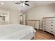 Spacious bedroom with wood floors, vaulted ceiling and dresser storage at 424 Citronelle Dr, Woodstock, GA 30188