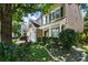 Beautiful home featuring a covered porch, meticulously landscaped yard, and charming curb appeal at 424 Citronelle Dr, Woodstock, GA 30188