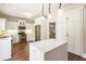 Eat-in kitchen featuring white cabinetry, stainless appliances, and a center island at 424 Citronelle Dr, Woodstock, GA 30188
