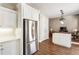 Open-concept kitchen featuring stainless appliances and seamless access to living room at 424 Citronelle Dr, Woodstock, GA 30188