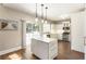Modern kitchen featuring white cabinets, stainless appliances, and a center island at 424 Citronelle Dr, Woodstock, GA 30188