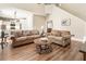 Large living room with open floor plan concept connects to modern kitchen at 424 Citronelle Dr, Woodstock, GA 30188