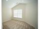 Bright bedroom with vaulted ceiling, neutral carpet, and ample natural light at 10770 Glenhurst Pass, Duluth, GA 30097