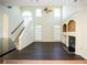 Bright open living room with fireplace, built-ins, and large windows for natural light at 10770 Glenhurst Pass, Duluth, GA 30097