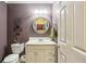 Cozy bathroom featuring neutral colors, a decorative mirror, and a modern vanity at 1386 Sheffield Glen Ne Way, Atlanta, GA 30329