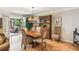 Cozy dining room featuring hardwood floors, decorative chandelier and porch access at 1386 Sheffield Glen Ne Way, Atlanta, GA 30329