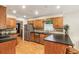 Bright kitchen with stainless steel appliances and wooden cabinetry at 1386 Sheffield Glen Ne Way, Atlanta, GA 30329