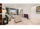 Charming living room features a large window, comfortable seating, and playful decor at 1909 Van Allen Ct, Dacula, GA 30019
