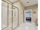 Bathroom features glass shower and view to bedroom at 25 Hampreston Court Ct, Johns Creek, GA 30022