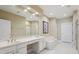 Large bathroom with double sinks, a soaking tub, and a glass shower enclosure at 25 Hampreston Court Ct, Johns Creek, GA 30022
