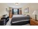 Comfortable bedroom features natural light and neutral decor to create a peaceful retreat at 25 Hampreston Court Ct, Johns Creek, GA 30022