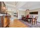 Bright dining room with a chandelier, hardwood floors, and an open floor plan at 25 Hampreston Court Ct, Johns Creek, GA 30022