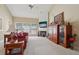 Cozy living room with a fireplace, comfortable seating, and lots of natural light at 25 Hampreston Court Ct, Johns Creek, GA 30022