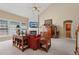 Comfortable living room featuring a vaulted ceiling, fireplace, and natural light at 25 Hampreston Court Ct, Johns Creek, GA 30022