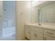 Bright white bathroom with long vanity and a shower at 2814 Tanner Lake Nw Trl, Marietta, GA 30064