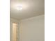 Neutral walls and carpet in this empty room at 2814 Tanner Lake Nw Trl, Marietta, GA 30064