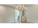 Spacious dining area showcasing hardwood floors and white trim and an open access to the staircase at 2814 Tanner Lake Nw Trl, Marietta, GA 30064