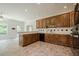 Well-equipped kitchen featuring wood cabinets, and views of the outside at 2814 Tanner Lake Nw Trl, Marietta, GA 30064