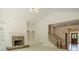 Inviting living room with a stone fireplace and built-in bookshelves at 2814 Tanner Lake Nw Trl, Marietta, GA 30064