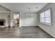 Spacious living room featuring new flooring, natural light, and an open layout at 3573 Plantation Pl, Loganville, GA 30052