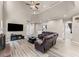 Spacious living room featuring fireplace, two-story ceilings and an open floor plan at 7090 River Island Cir, Buford, GA 30518