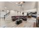 Open floor plan featuring two-story ceilings and an open eat-in kitchen and fireplace at 7090 River Island Cir, Buford, GA 30518