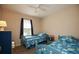 bedroom with twin beds, a ceiling fan, and a window at 177 Rustin Dr, Dallas, GA 30157