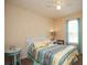 Cozy bedroom featuring a ceiling fan and a window providing natural light at 177 Rustin Dr, Dallas, GA 30157