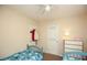 room featuring twin beds, a dresser, and plenty of closet space at 177 Rustin Dr, Dallas, GA 30157