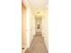 Hallway with neutral paint and carpet flooring at 177 Rustin Dr, Dallas, GA 30157