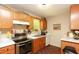 Functional kitchen with stainless steel appliances and ample counter space beneath a window providing natural light at 177 Rustin Dr, Dallas, GA 30157