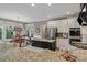 Stylish kitchen with granite countertops, stainless steel appliances, and an island at 295 Sagamore Nw Cv, Sugar Hill, GA 30518