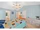 Comfortable bedroom with a ceiling fan, natural light and a neutral color scheme at 5055 Southland Dr, Woodstock, GA 30188