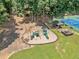 Community playground with slides, swings, and picnic areas, perfect for families at 5055 Southland Dr, Woodstock, GA 30188