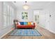 Bright living room with hardwood floors, stylish furnishings, and natural light at 5710 Waters Edge Trl, Roswell, GA 30075