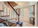 Inviting foyer with tile flooring, a staircase, and a view into other areas of the home at 965 Grimes Bridge Rd, Roswell, GA 30075