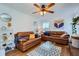 Spacious living room with hardwood floors, comfortable seating, and natural light at 965 Grimes Bridge Rd, Roswell, GA 30075