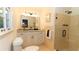 Bright bathroom featuring granite countertop, modern fixtures, and walk-in shower at 3873 Rains Ne Ct, Brookhaven, GA 30319