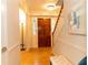 Inviting foyer with hardwood floors, staircase, and stylish lighting fixture at 3873 Rains Ne Ct, Brookhaven, GA 30319