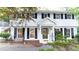 Beautiful home with a welcoming porch, black shutters, and plenty of natural light at 3873 Rains Ne Ct, Brookhaven, GA 30319