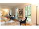 Bright living room with hardwood floors and ample natural light from large windows at 3873 Rains Ne Ct, Brookhaven, GA 30319