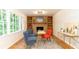 Cozy living room with fireplace, stylish furniture, and large windows at 3873 Rains Ne Ct, Brookhaven, GA 30319