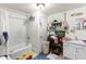 Full bathroom with a tub/shower combo, window, and vanity at 1054 Hillcrest Se Dr, Atlanta, GA 30316