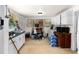 A small kitchen area features white cabinets, a window, and various appliances at 1054 Hillcrest Se Dr, Atlanta, GA 30316