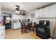 Functional kitchen area with ample cabinet space, stove, and space for a cozy dining table at 1054 Hillcrest Se Dr, Atlanta, GA 30316